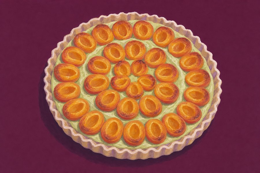A round tart seen from slightly above with apricot halves laid cut-side up in concentric rings on a pale pistachio-green cream, in a fluted pastry case.