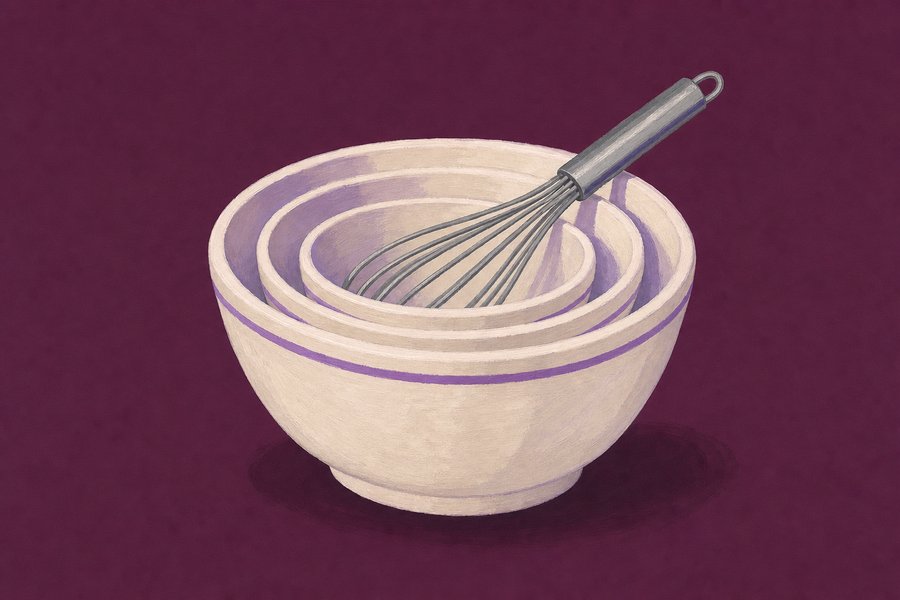Three nested cream stoneware mixing bowls with a thin violet band near each rim, a plain steel balloon whisk resting across the top.